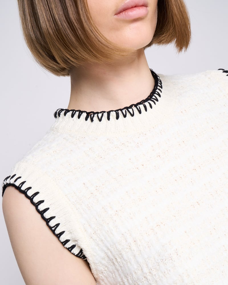 Milk White Sleeveless Knit Top with Black Contrast Trim