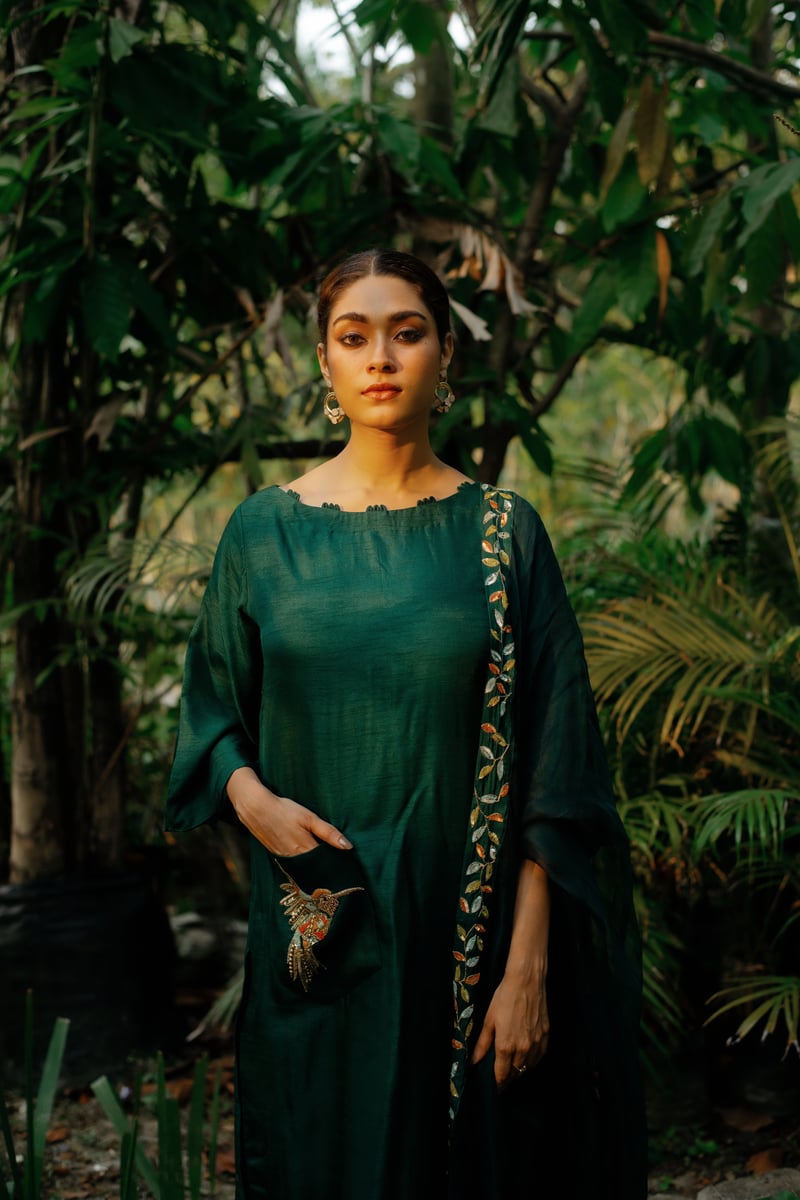 Green A-Line Kurta Set with Boat Neck and Embroidered Pocket