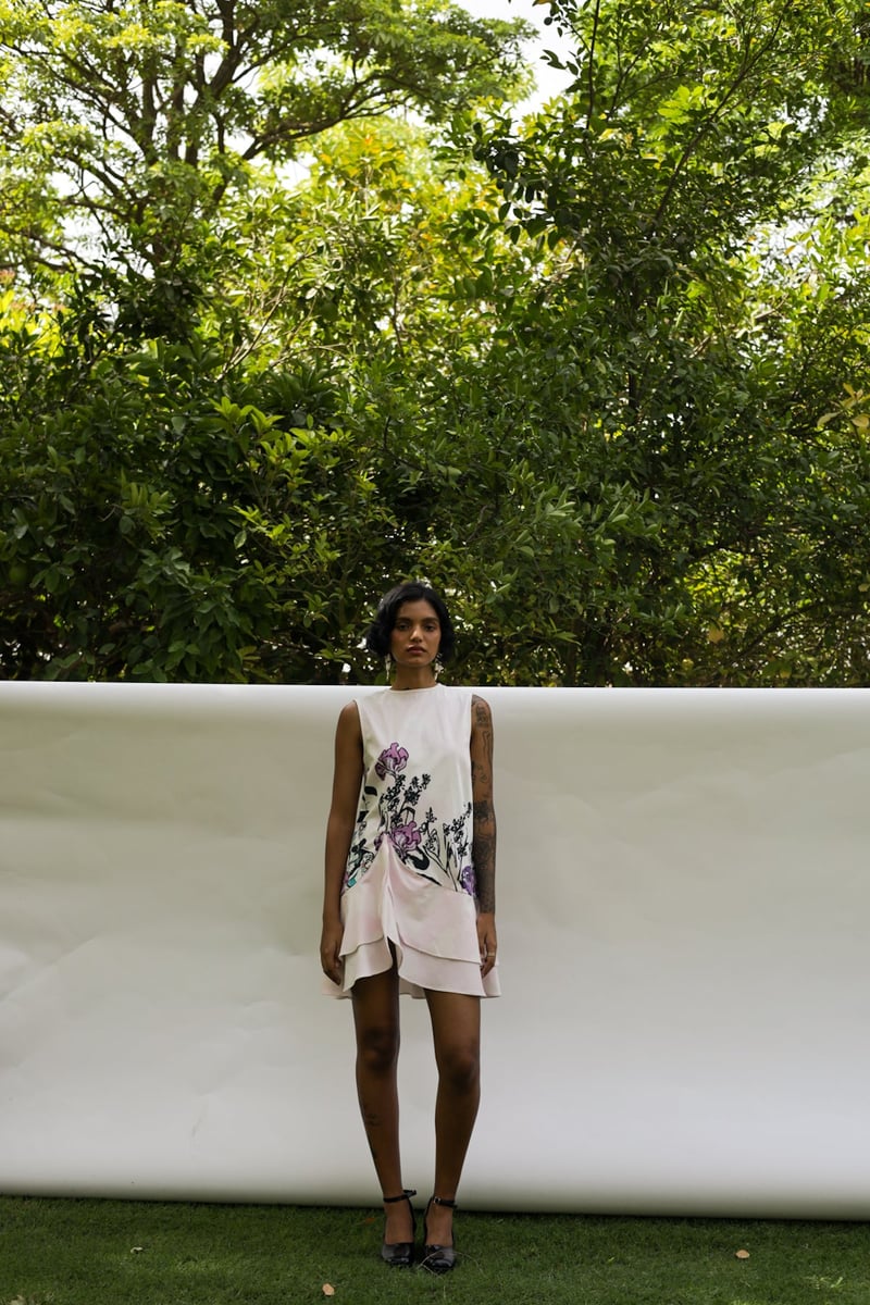 White/Black Printed Sleeveless Mini Dress with Ruffle Hem