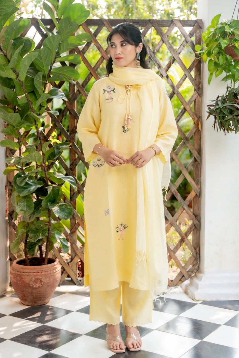 Pastel Yellow Linen Kurta Set with Embroidered Motifs