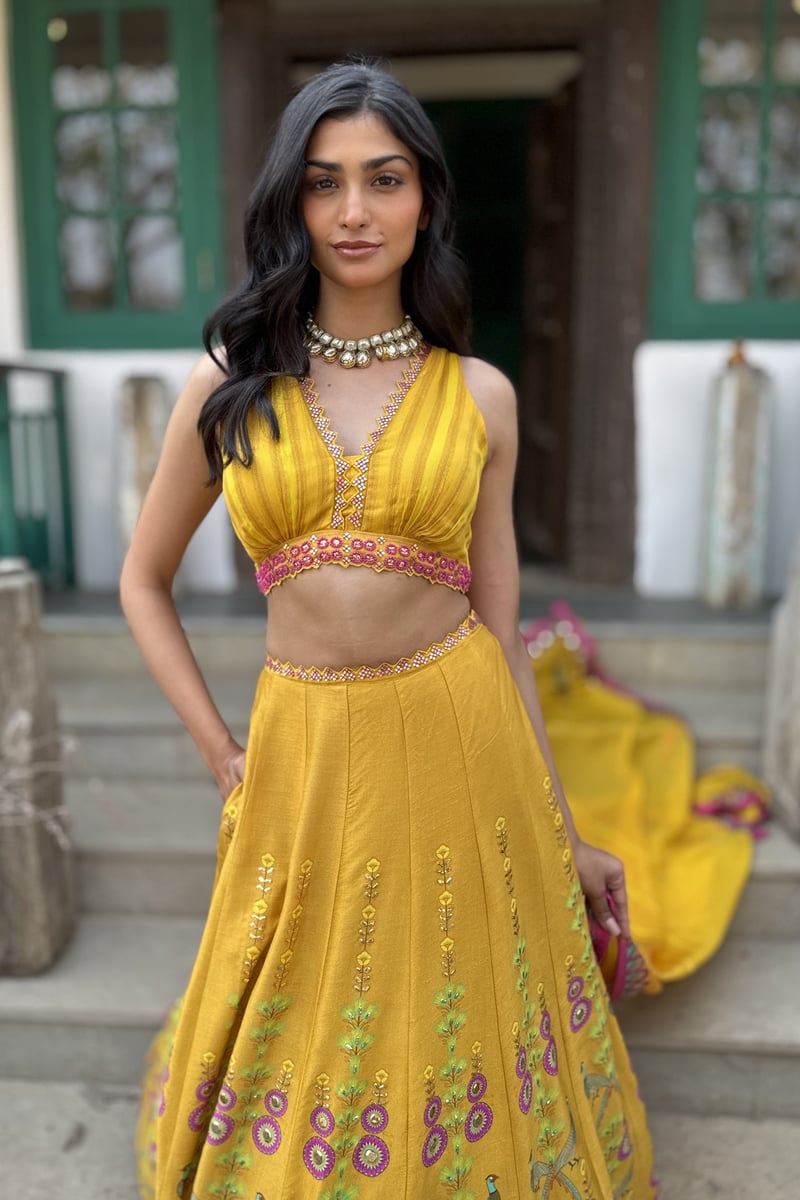 Yellow Printed Lehenga Set with Embroidered Tie-Back Blouse