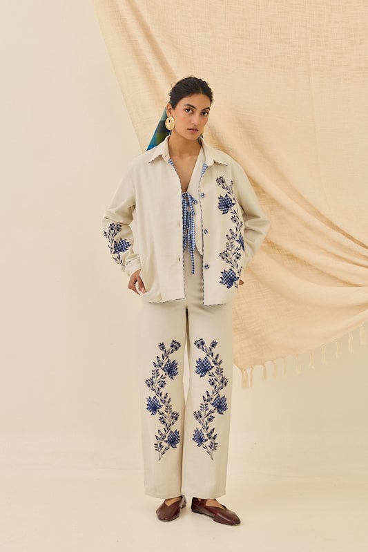 Off-White Denim Trousers with Navy Floral Placement Motif