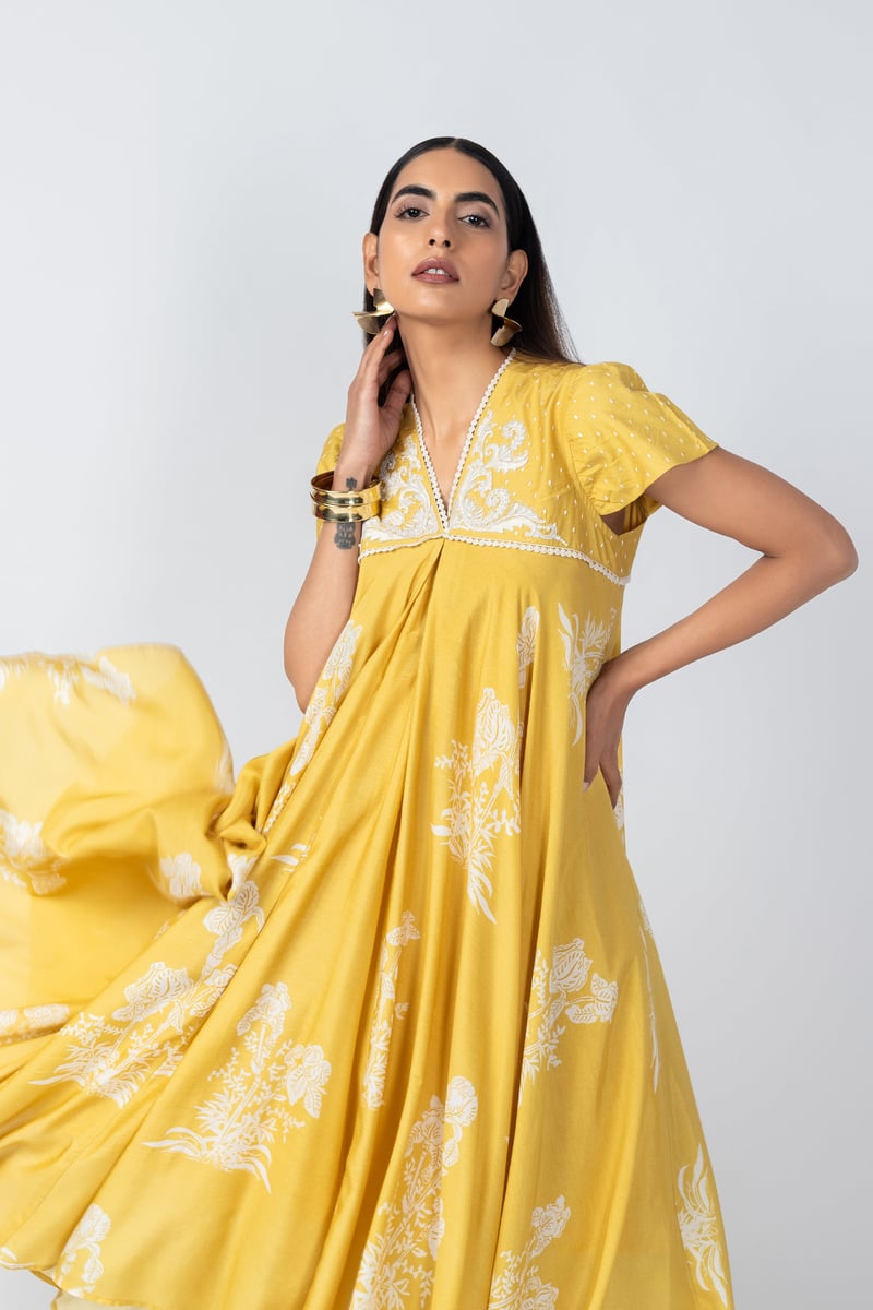 Yellow Floral Printed Asymmetrical Kurta Set with Straight Pants