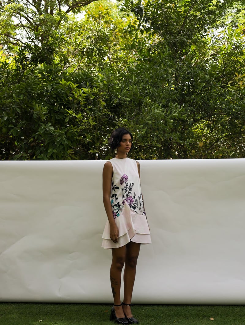 White/Black Printed Sleeveless Mini Dress with Ruffle Hem