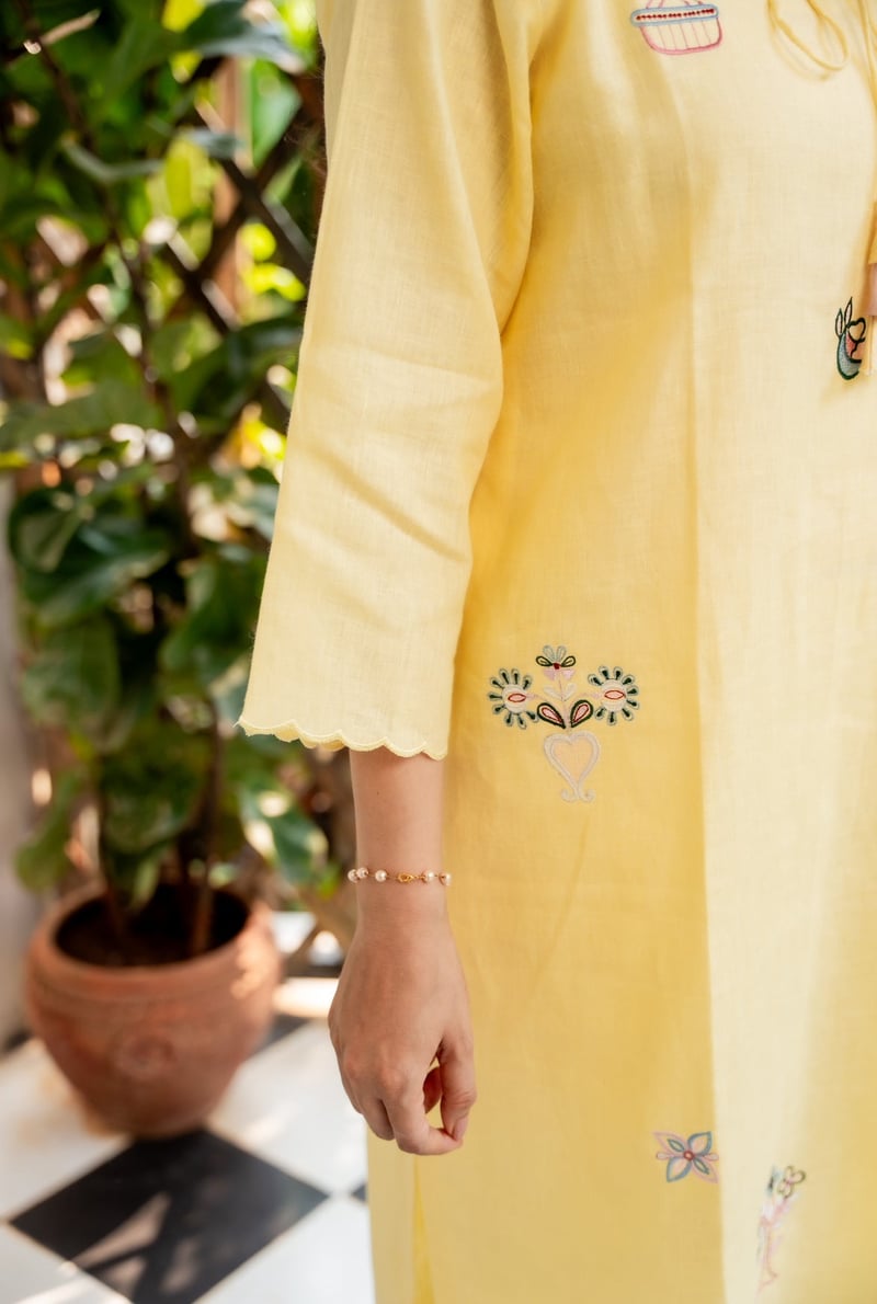 Pastel Yellow Linen Kurta Set with Embroidered Motifs