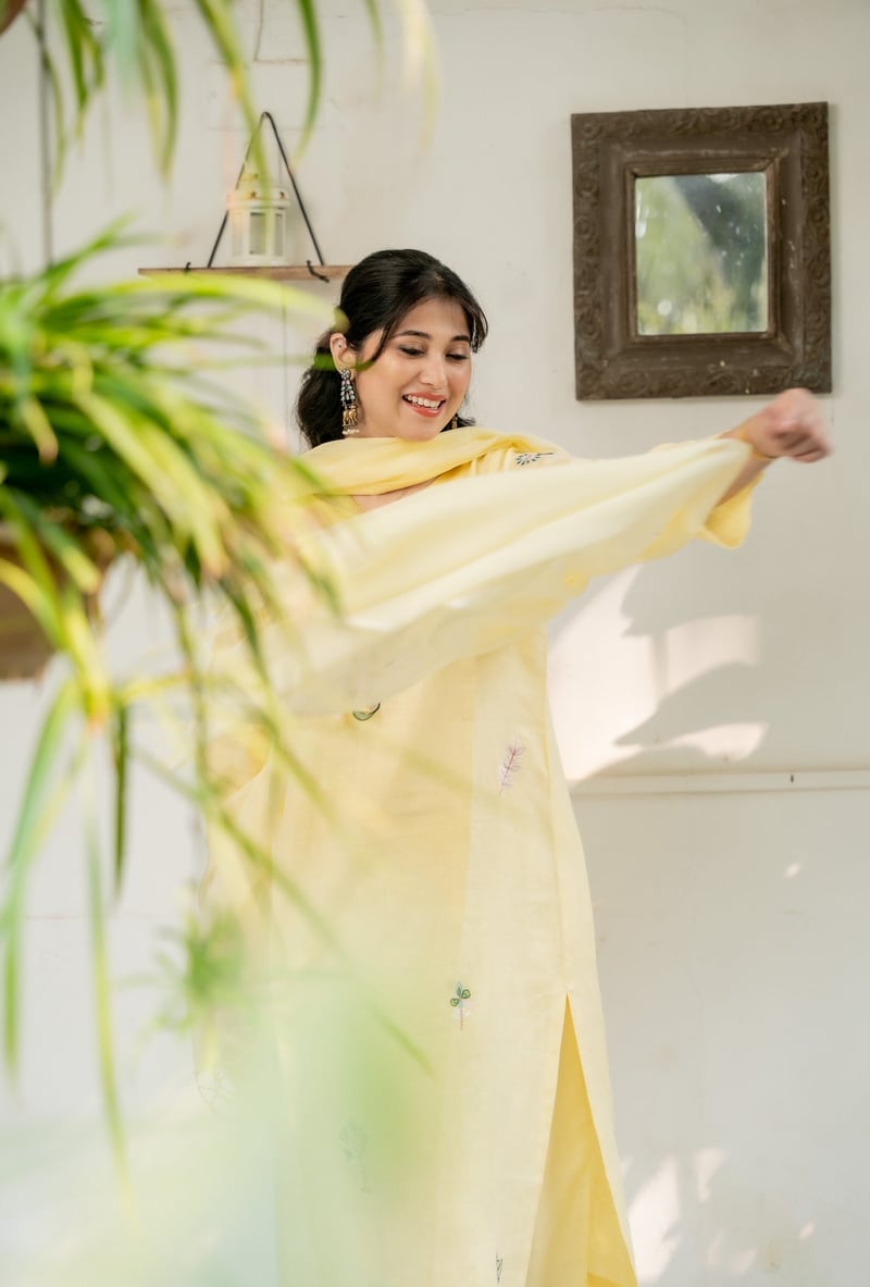 Pastel Yellow Linen Kurta Set with Embroidered Motifs