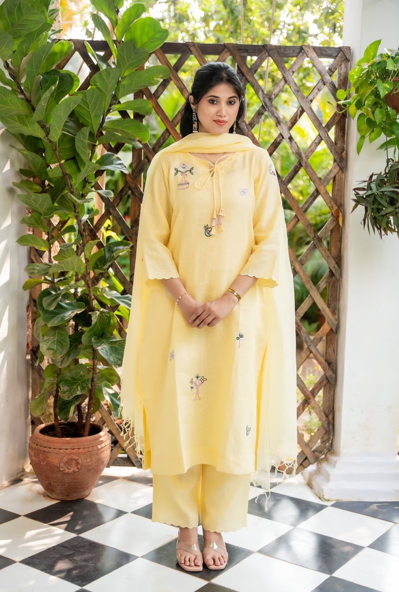 Pastel Yellow Linen Kurta Set with Embroidered Motifs